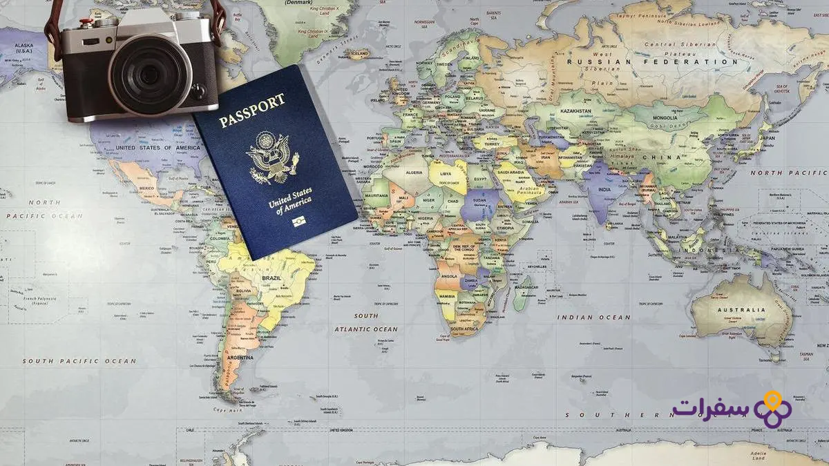 iraq travel requirements guide 1 2 خريطة للعالم مفرودة على طاولة، من أدوات التخطيط للسفر وتجهيز الوثائق.