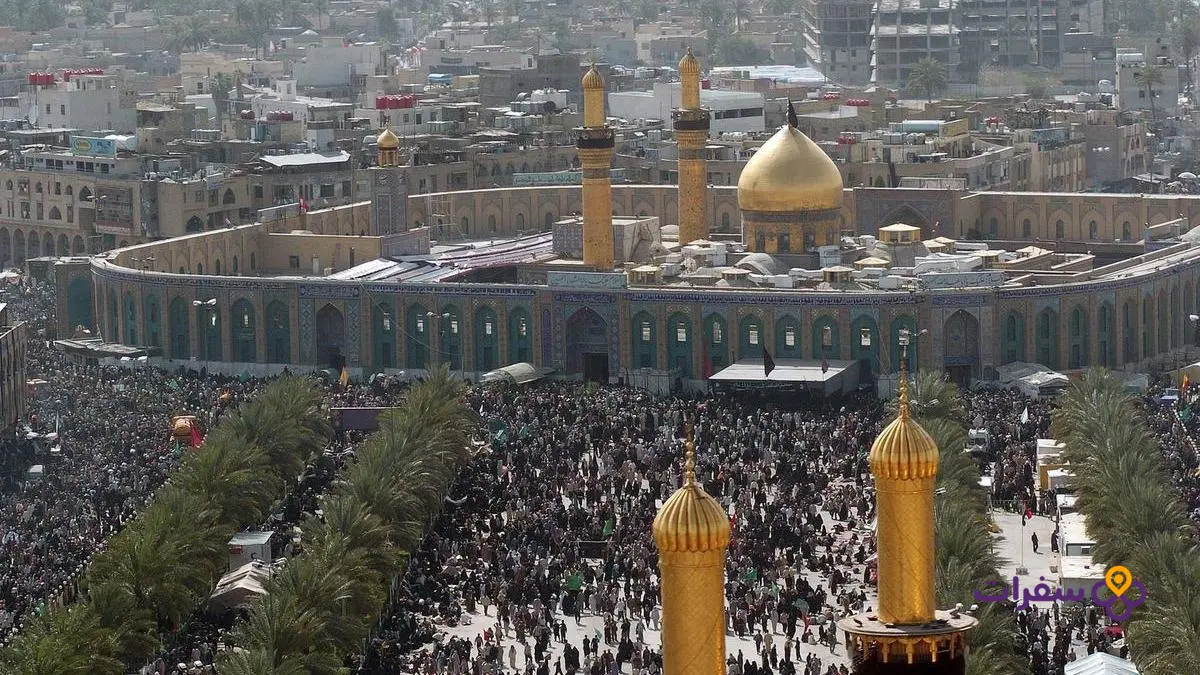 Crowds of visitors and pilgrims converging on the shrine of Imam Hussein in Karbala during a busy pilgrimage season.
